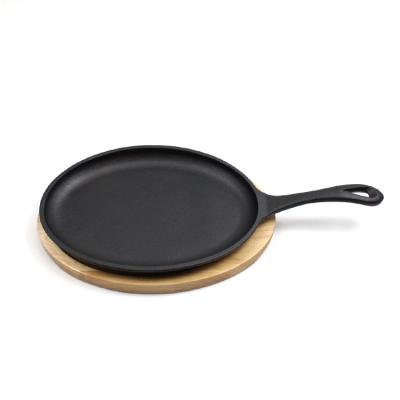 China Sustainable Cast Iron Steak Fajita Casserole Sizzling Dish With Wooden Base for sale