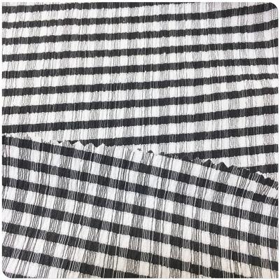 China 2022 Viable Hot Sale Summer Warp Knitted Plaid Crepe 98% Polyester 2% Spandex Fashion Black And White Women Wear for sale