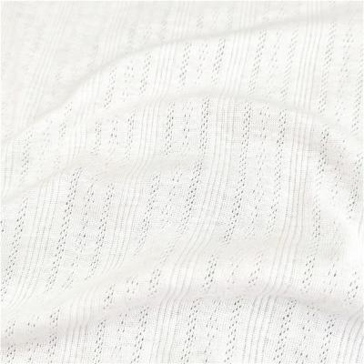 China Viable Interesting Buy Cotton Polyester Eyelet Fabric White Hole In Fabric Spring Summer Fashion Dress Garment Fabric for sale