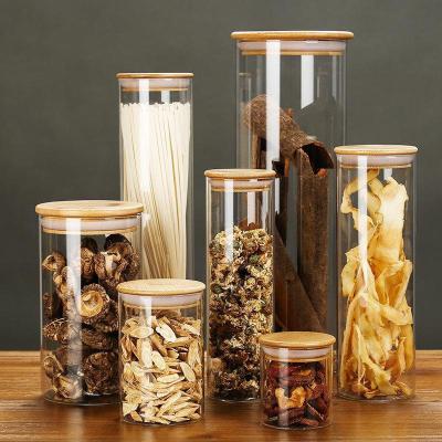 China 2023 Hot Sales Custom High Borosilicate Round Glass Canister Square Airtight Storage Jar Lid Bamboo Candy Jar Storage Freshness Canister for sale