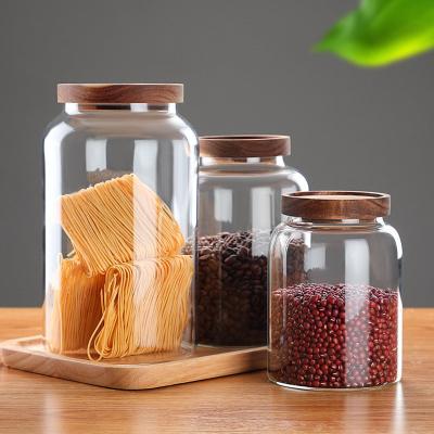 China Freshness Preservation Storage Bottle Jars Shaped Aitight Kitchen Food Storage Spice Glass Jars With Lids for sale