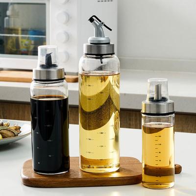 China Hot Selling Borosilicate 300ml High Quality Glass Oil Freshness Preservation Jar Bottle 500ml Oil&Vinegar Lead Free Dispenser Set With Graduated for sale