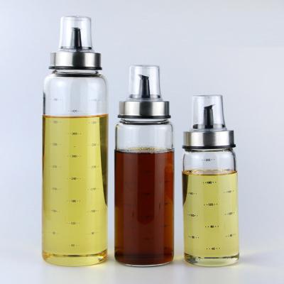 China Freshness Preservation 500ml Borosilicate Glass Cooking Oil Bottle Glass Olive Oil Vinegar Dispenser Bottle With Spout For Kitchen for sale