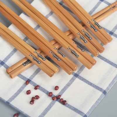 China Biodegradable Round Bamboo Chopsticks Reusable Natural Wooden Chopsticks Sustainable Customizable for sale