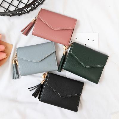 China 2020 new fashion style small retro student Korean fashionable simple folding personality wallet for sale