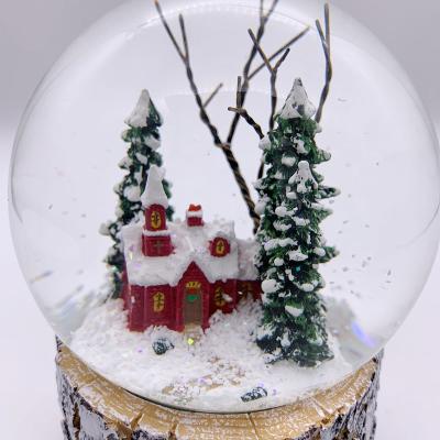 China 100MM World Scene Resin Country Winter Snow Hand Painted Globe for sale