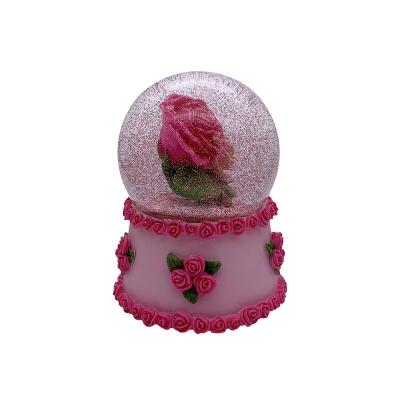 China Resin Rose Flower 100MM LED Snow Musical World Blowing Globe for sale