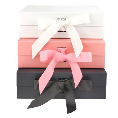 China Recycled Magnetic Folding Wedding Dress Clothes Paper Cardboard Materials Rigid Custom Packaging Boxes With Ribbon for sale