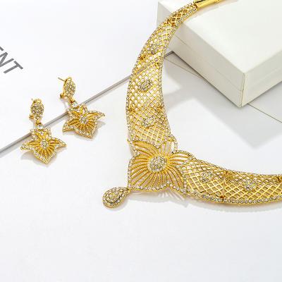 China Latest FASHIONABLE Design 24k Gold Plated Wholesale Artificial Jewelry Set Heart Pattern Diamond Bracelet Earrings Ring Chain Jewelry Set for sale