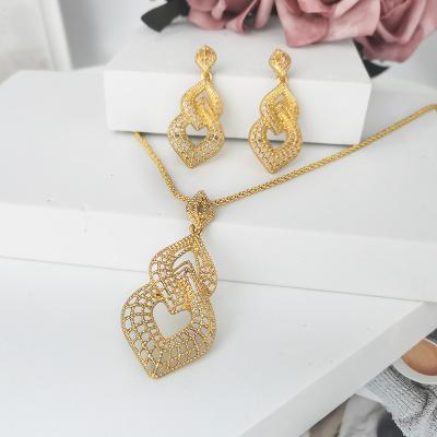 China TRENDY Bridal Jewelry Sets Earrings And Pendant Set Woman 2 Pieces Necklace 24K Gold Plated Copper For Nigeria African Jewelry Gift for sale