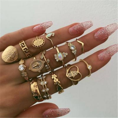 China Retro Hiphop Beauty Head Gold Coin Cross Pattern With Diamond Love Ring Set for sale