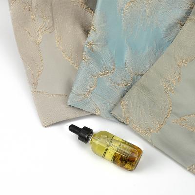 Κίνα Jacquard Embossed Gold Silk Leaf Luxury High Grade Curtain Living Room Curtain Fabric προς πώληση