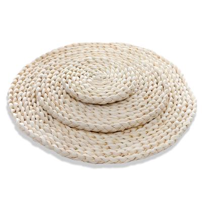 China Handmade Woven Dining Table Mat Heat Insulation Pot Holder 30cm Viable Corn Fur Around Coasters Coffee Drink Cup Office Oval Place Mats for sale