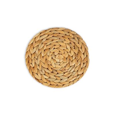 China Sustainable Natural Water Squash Hyacinth Woven Placemat Round Woven Pad Home Deco Coaster 10cm Dining Rattan Wedding Table Mat for sale