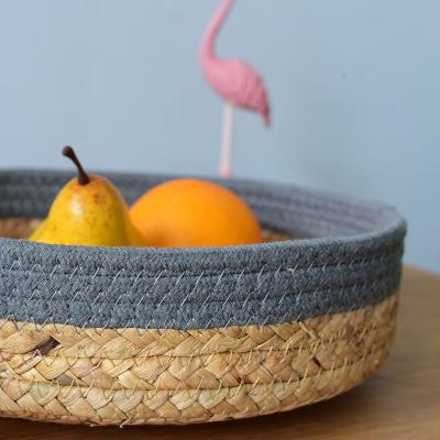 China Viable Daily Snack Fruits Hyacinth Container Woven Cotton Rope Straw Storage Friendly Home Decoration Water Around Storage Baskets for sale