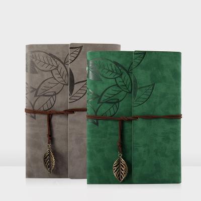 China A5 Vintage Durable Leather Journal Professional Custom Leather Travel Notebook Leather With Leaves Pendant for sale