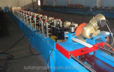 China Euro Style GCr15 PU Foam Roller Shutter Door Roll Forming Machine for sale