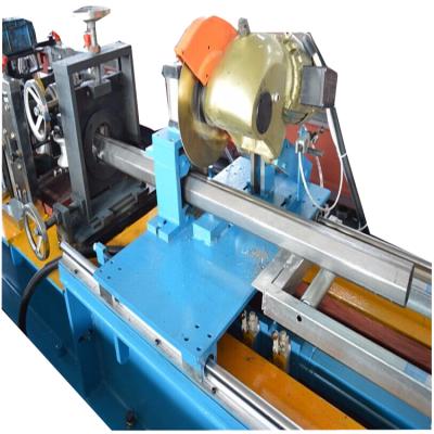 China Easy Operation Roller Shutter Door 60mm Octagon Shaft Steel Pipe Roll Forming Machine for sale