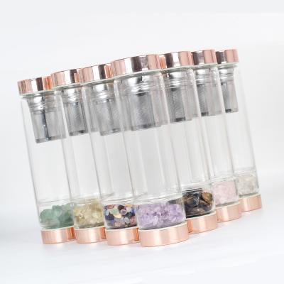 China Viable Wholesale Natural Crystal Wands Gravel Stone Infused Rose Gold Gemstone Crystal Glass Water Bottle for sale