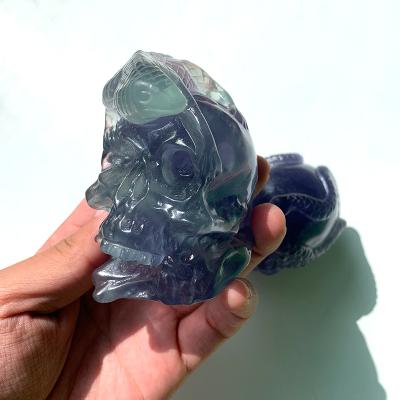 China China Wholesale Hand Carved Natural Rainbow Blue Fluorite Crystal Skulls For Decoration for sale