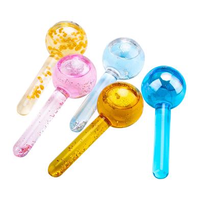 China Comfortable Clear Blue Yellow Facial Magic Ice Globes Cryo Massage Ice Pink Roller Cooling Roller Set New for sale