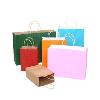 China Cute Recyclable Colorful Printing Kraft Paper Small Bags With Twisted Handle for sale