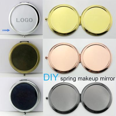 China 2022 DIY High Quality Promotional Design 70mm Round Shape Customized Professional Folding Portable Makeup Mirror for sale