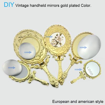 China Custom Logo Metal Portable Foldable Gold Circle Makeup Hand Mirror Personalized Vintage With Handle for sale