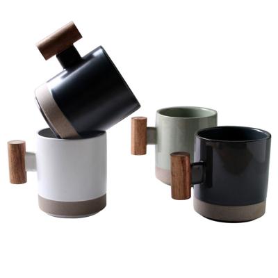 China 2022 New Design Contemporary Korean Ceramic Coffee Drinking Mug With Wooden Handle for sale