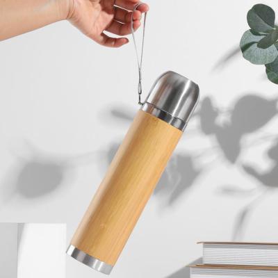 China 500ml Double Wall Stainless Steel Portable Sustainable Indoor Wooden Bamboo Vacuum Insulated Thermal Tea Flask With Rope for sale