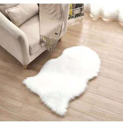 China Stain Resistant Ultra Soft Indoor Modern Area Rugs Customized Blankets Fluffy Faux Fur Animal Rugs And Blankets For Bedroom for sale