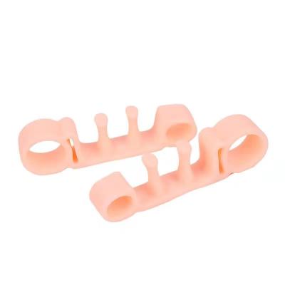 China Comfortable In Elastic Toe Separator Silicone Gel Toe Stretchers Cloth Top Elastic Bunion Rubber Toe Stretchers For Night for sale