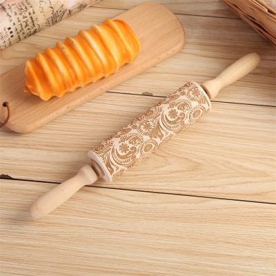 China Newell Wholesale Gingerbread Fondant Dough Mini Kids Wood Embossing Christmas Viable Wood Embossing Pin With Design for sale