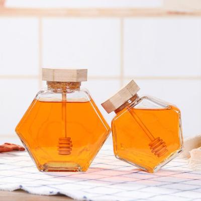 China 100% Newell Glass 220Ml 380Ml Mini Hexagonal Storage Container Hexagon Unique Luxury Empty Biodegradable Honey Dipper For Honey Bottles for sale