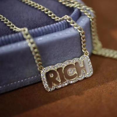 China Hot Selling Solid Gold TRENDY Rich Letter Necklace For Girls RICH Cuban Link Chain With Instagram Fashion Extend Chain for sale