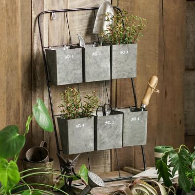 China INS Wrought Iron Wall Hanging Gardening Tool Storage Rack Home Nordic Decoration Nordic Wall Hanging Garden Decoration for sale