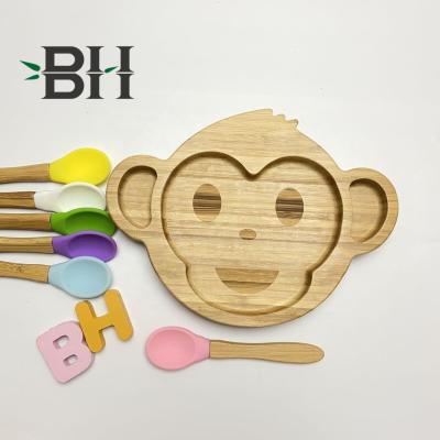 China Sustainable Natural Bamboo Toddler Silicone Feeding Training Suction Cute Monkey Shape Suction Flat for sale