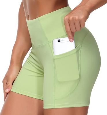 China Breathable Breathable And Quick-Drying Sports Slim Short Ice Silk Yoga Pants Running Shorts With Pockets for sale