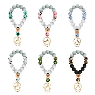 China Key Chain Key Ring Modern Unique Stylish Beaded Bangle Silicone Bracelet For Women for sale