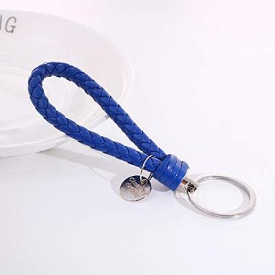 China New Modern Design Lanyards Leather Weaving Key Ring Key Chain for Women and Men for sale