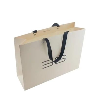 China Large Size Custom Eco - Friendly Recyclable Paper Bags Kraft Paper Gift Bag Luxury Shopping Paper Bag for sale