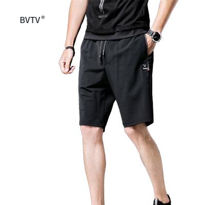 China Casual Quick Dry Sweat Camouflage Mesh Anti-Wrinkle Men Fitness Shorts for sale