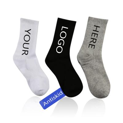 China Custom Wholesale Sporty Logo Socks Anti Slip Athletic Cotton Sports Socks for sale