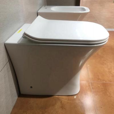 China Double-Flow Sanitary Ware Square Rimless Wall Hung Toilet And Floor Toilet for sale