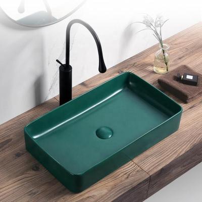 China Modern Matte Green Ceramic Wash Basin/Black/Grey Circular Art Table Basin Toilet for sale