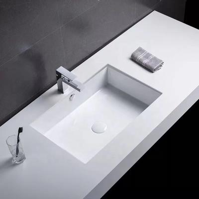 China Easy Clean Various Sizes Rectangular Ceramic Vanity Basin Bathroom Undermount Sink With Cupc for sale