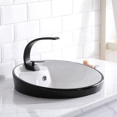 China Modern Wholesale Taichung Bathroom Sink White Ceramic Basin Edge With Light Black Color Glazed for sale