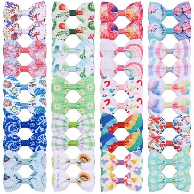 China Cute Stocked Puppy Bowknot Hair Bows With Metal Clips Hair Bow Handmade Pet Grooming Products for sale