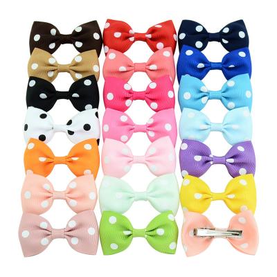 China Stocked Polka Dot Bowknot Dog Hair Bows with Metal Clips Pet Grooming Hair Accessories for sale