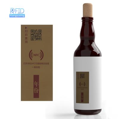 China Waterproof / Waterproof 13.56MHz RFID Coated PET NFC Sticker Paper Anti-Counterfeiting Fragile Labels For Wine for sale